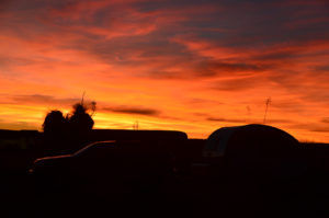 Jeep and Trailer silhoutted against the sunset